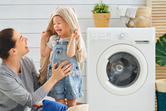 How do you clean the washer and dryer with vacuum?
